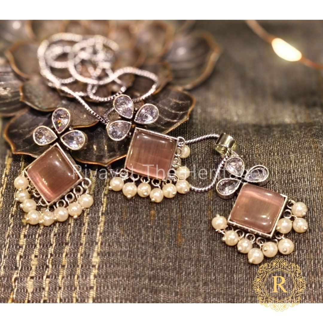 Handcrafted rose quartz German silver earrings and pendant set with pearl drops by Rivayat Heritage traditional jewelry collection