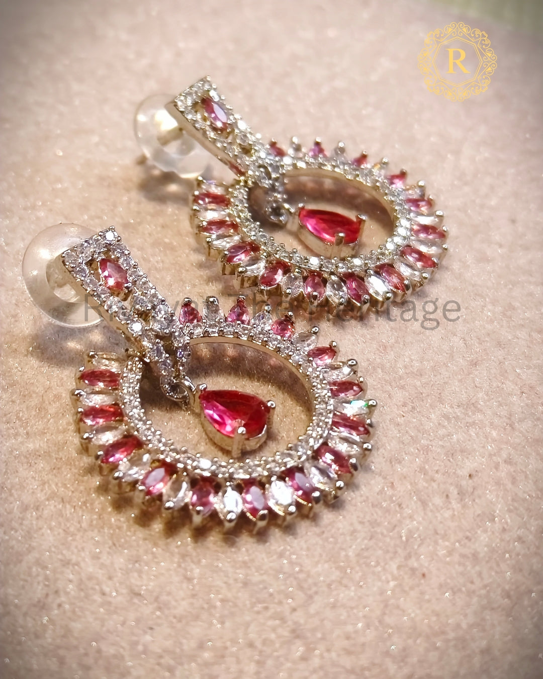 Handcrafted pink zircon drop earrings, detailed stone setting view