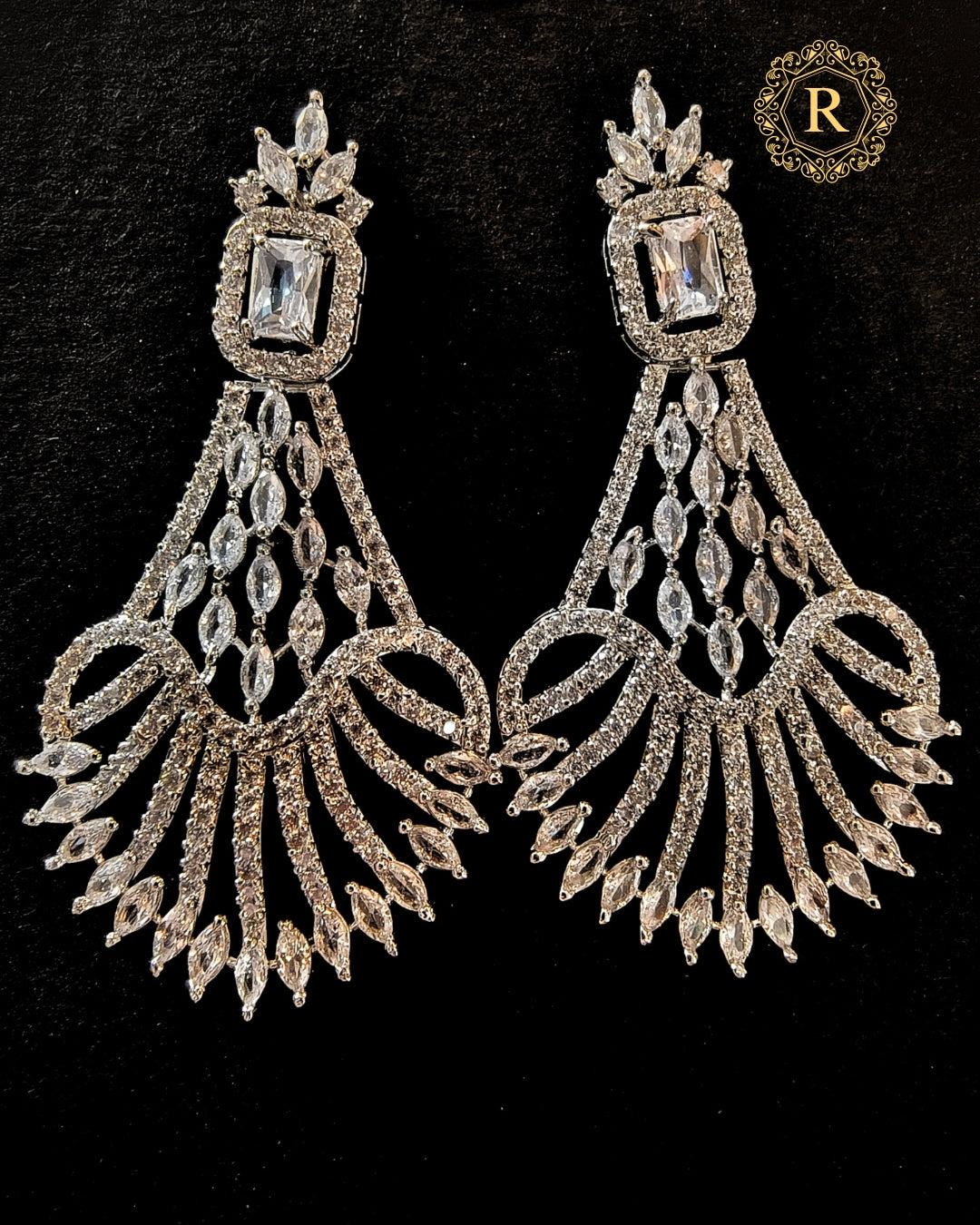 Silver zircon diamond fan drop earrings with emerald-cut centerpiece – Rivayat Heritage