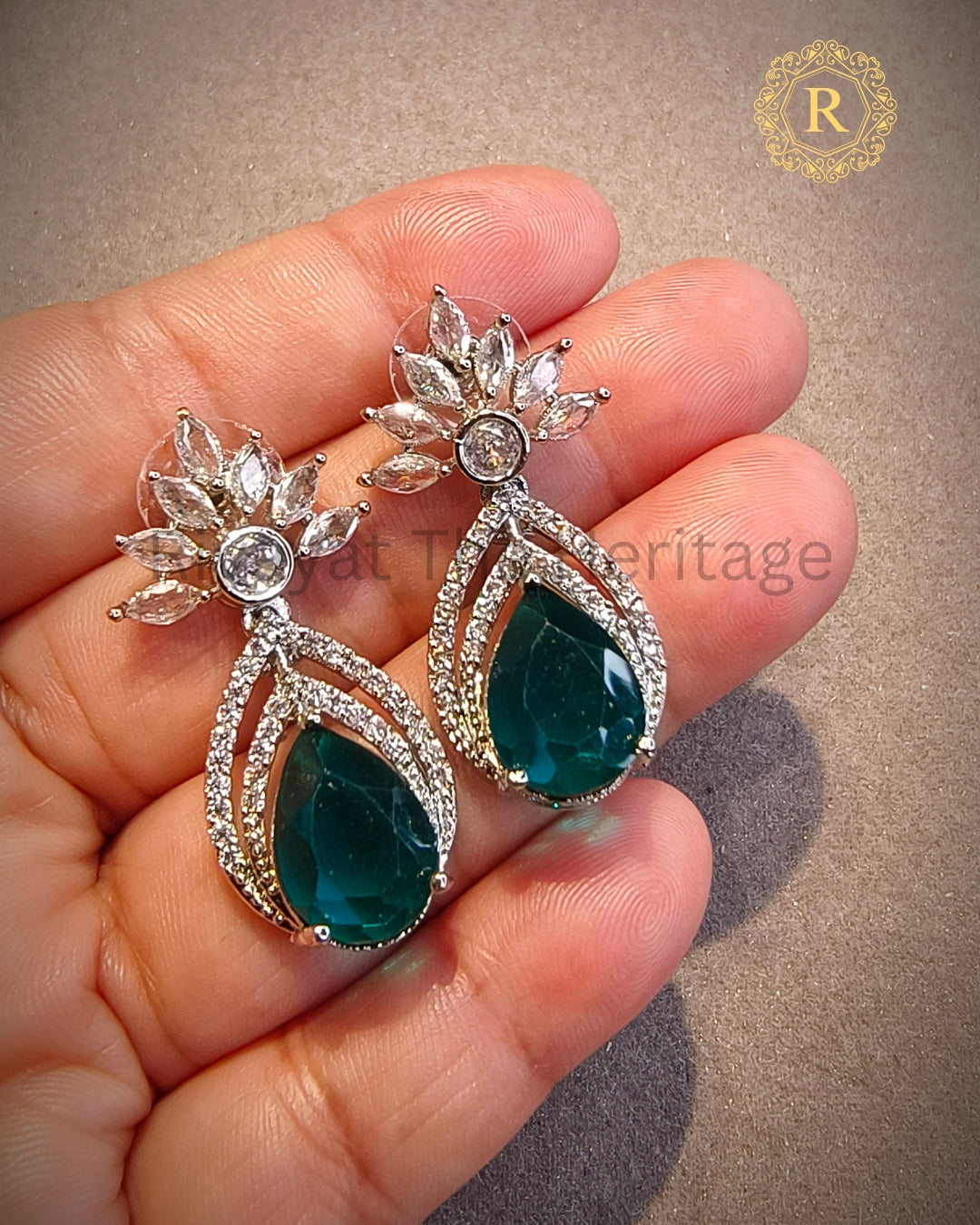 Emerald zircon drop earrings styled view showing sparkle and craftsmanship