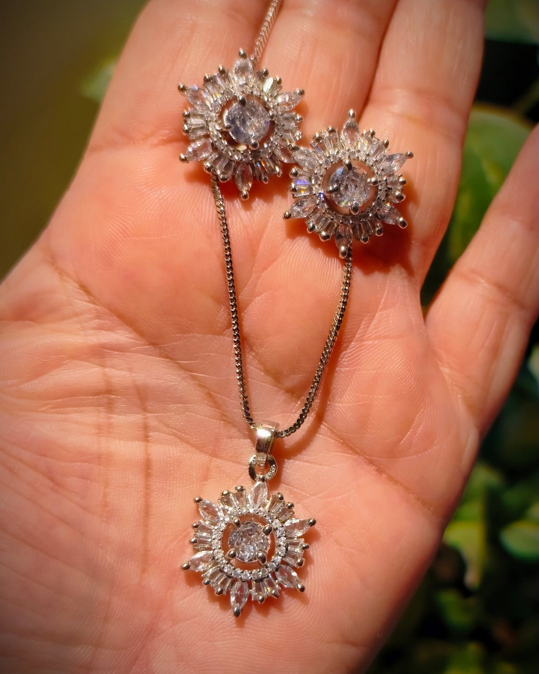 Floral zircon diamond necklace set with matching earrings and pendant in silver-tone finish