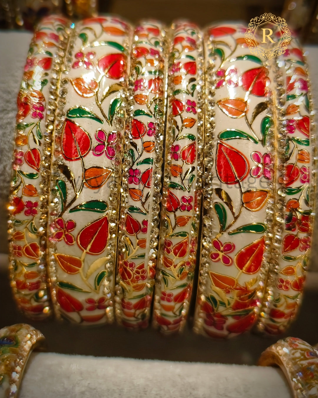 White Meenakari bangle set with red pink green floral enamel work