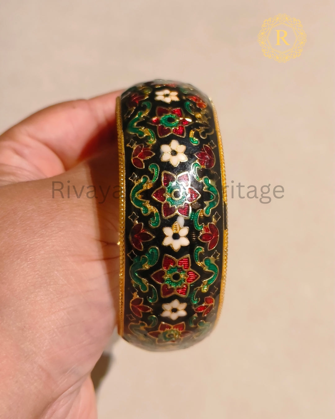 Black floral Meenakari kada showing detailed multicolour enamel work and traditional Indian design