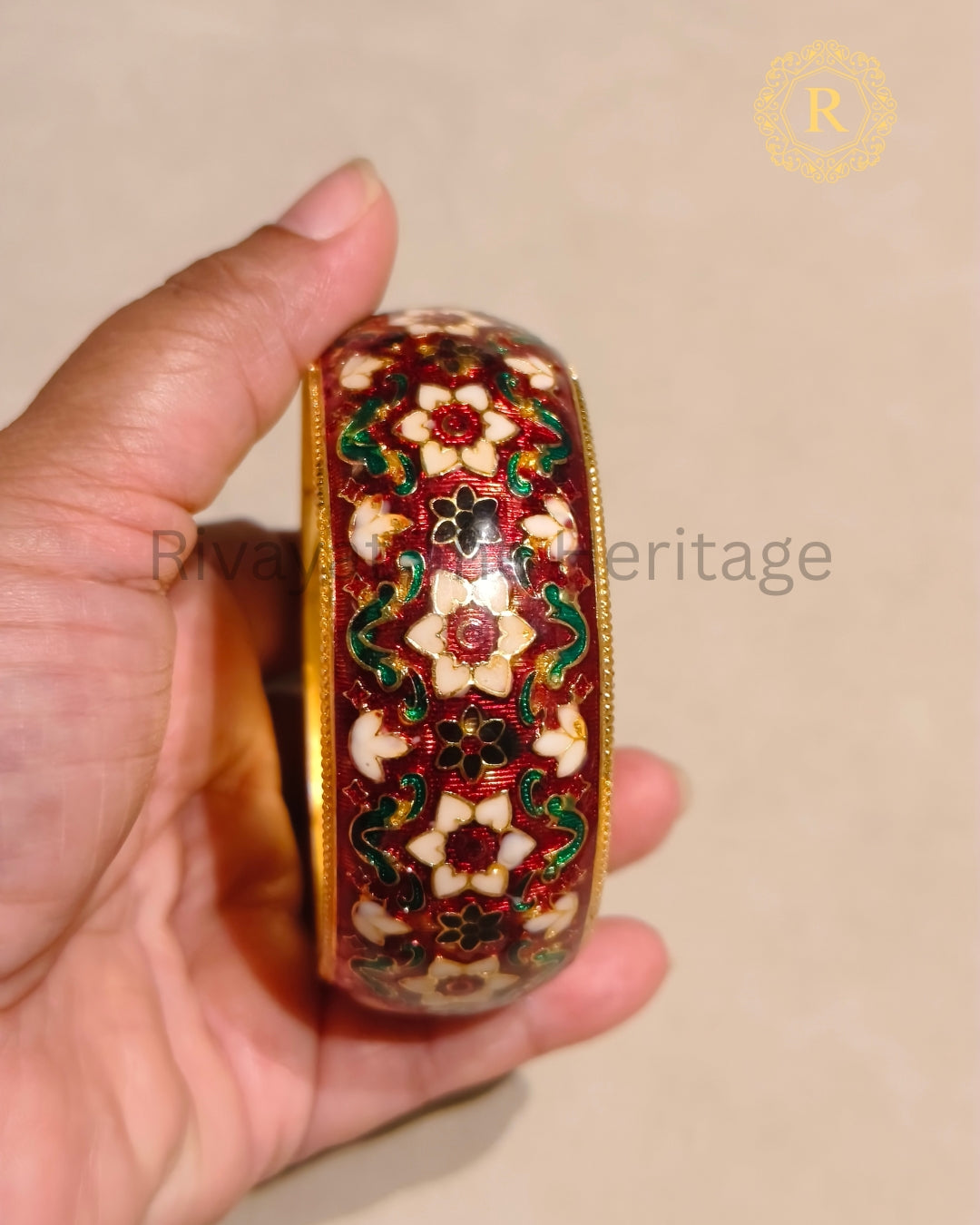 Maroon floral Meenakari Kada showing traditional enamel detailing and gold-tone finish