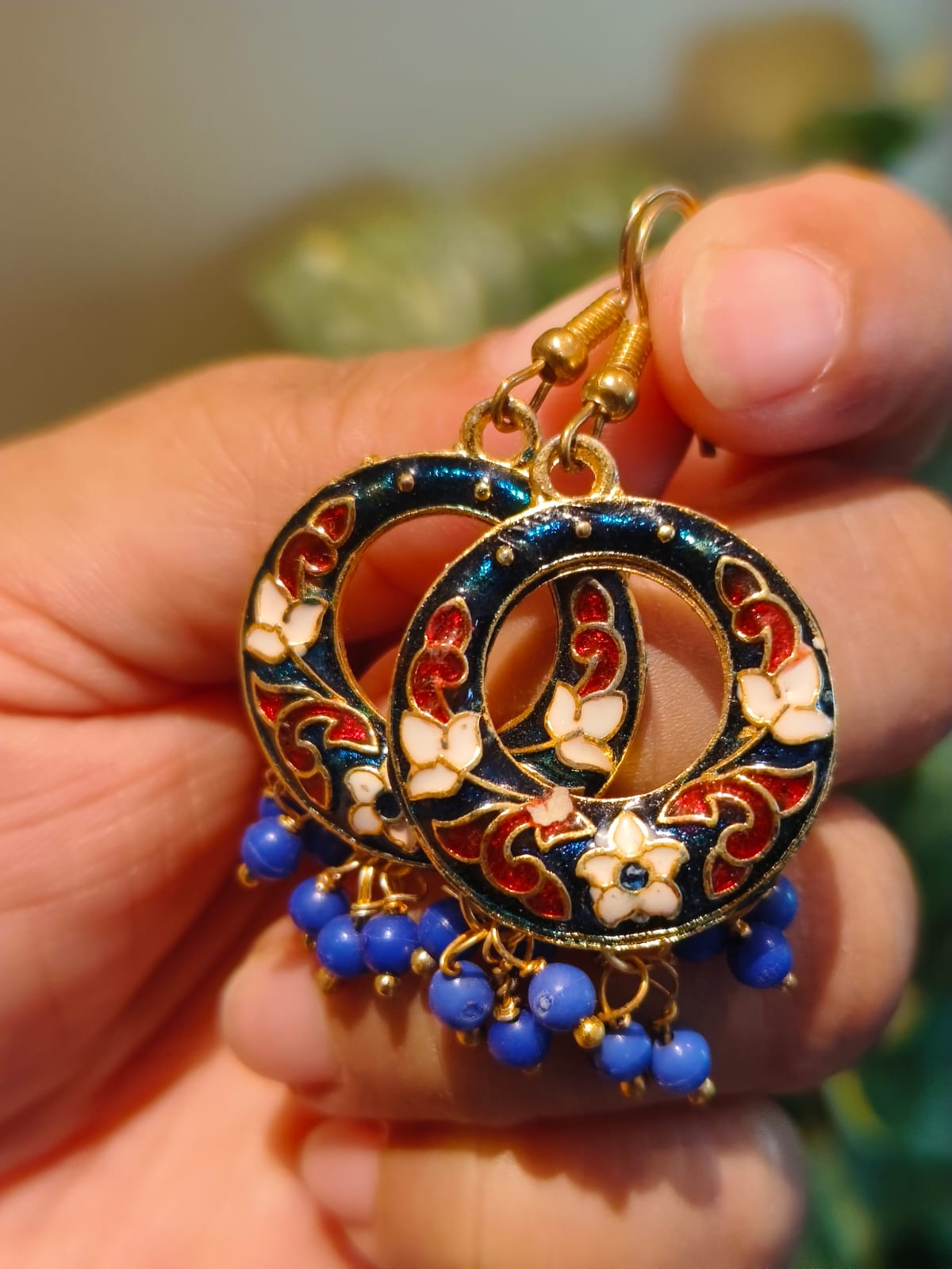 Pair of handcrafted Meenakari hoop earrings in navy blue with gold-tone base and blue bead drops – authentic Indian artisan jewellery by Rivayat