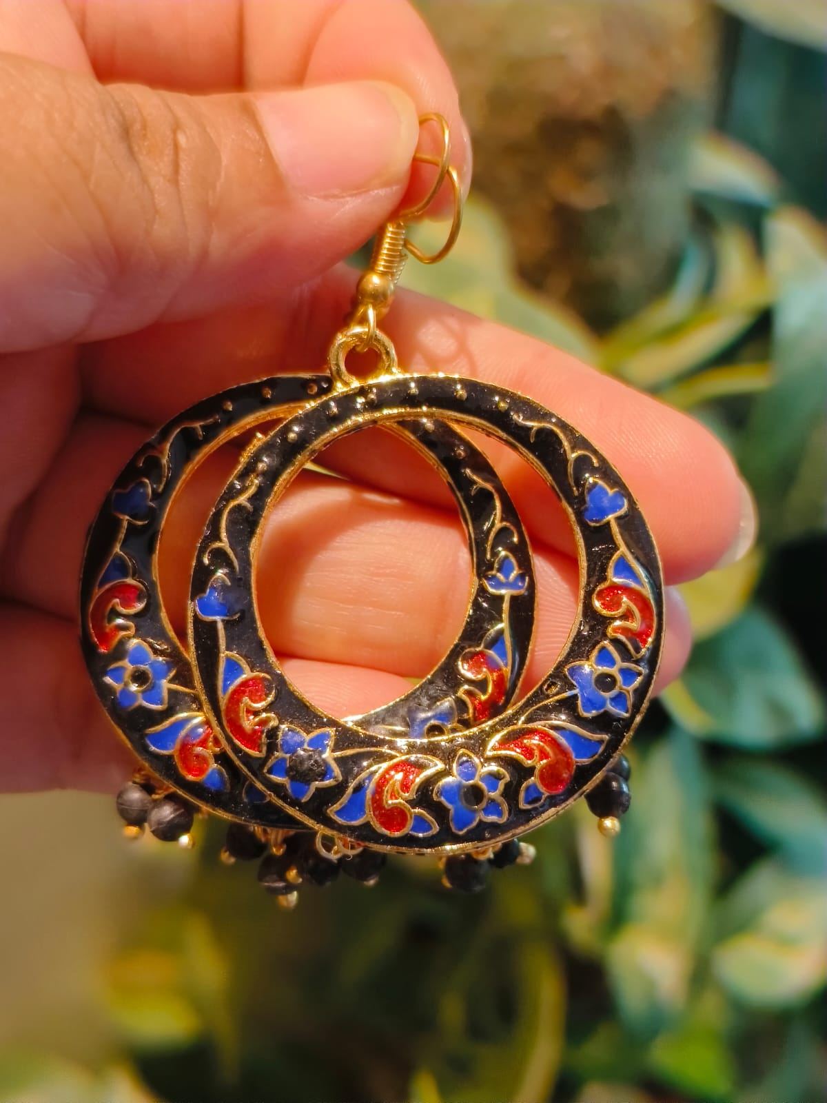 Handcrafted black Meenakari double hoop earring with blue and red floral enamel work and black bead drops – Rivayat Manika Collection