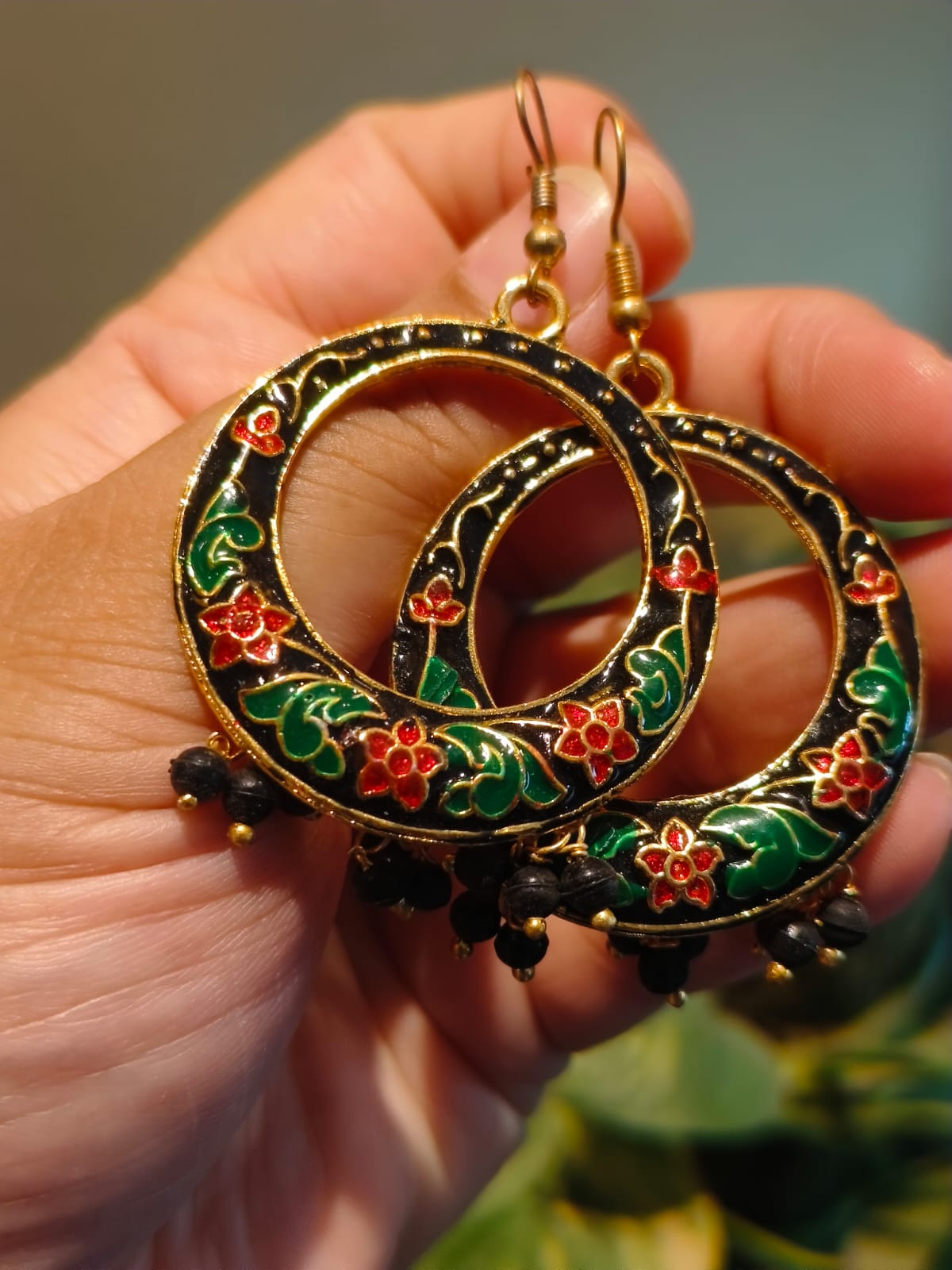 Black Meenakari large hoop earrings with red floral enamel and green leaf work, handcrafted artisan jewellery from India – Rivayat Heritage Manika Collection