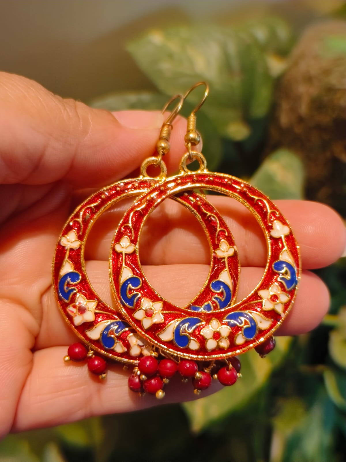 Handcrafted Meenakari gold-toned hoop earrings in red and blue enamel — Indian artisan jewellery by Rivayat
