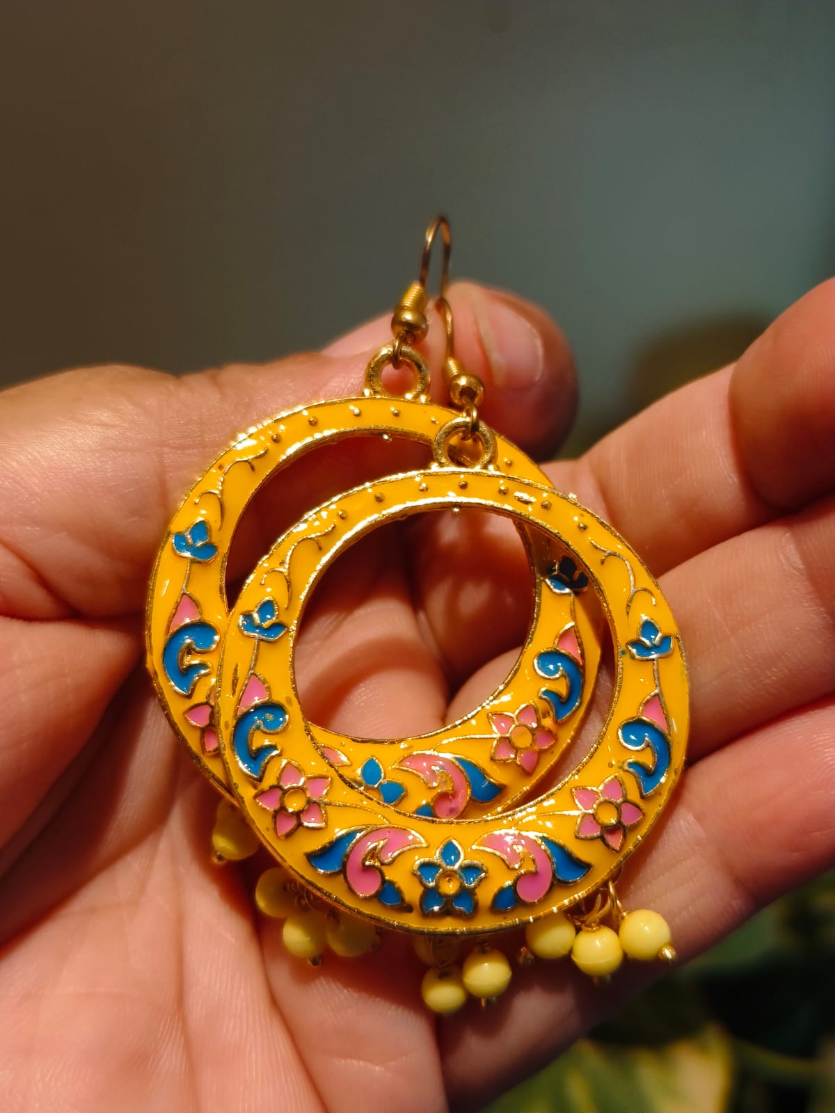Handcrafted yellow Meenakari hoop earring with pink and blue floral enamel work and cream bead drops — Rivayat Manika Collection