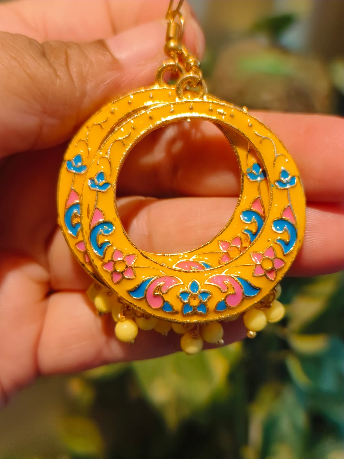 Yellow enamel Meenakari hoop earring with traditional floral motifs and gold-tone base — Rivayat Heritage artisan jewellery