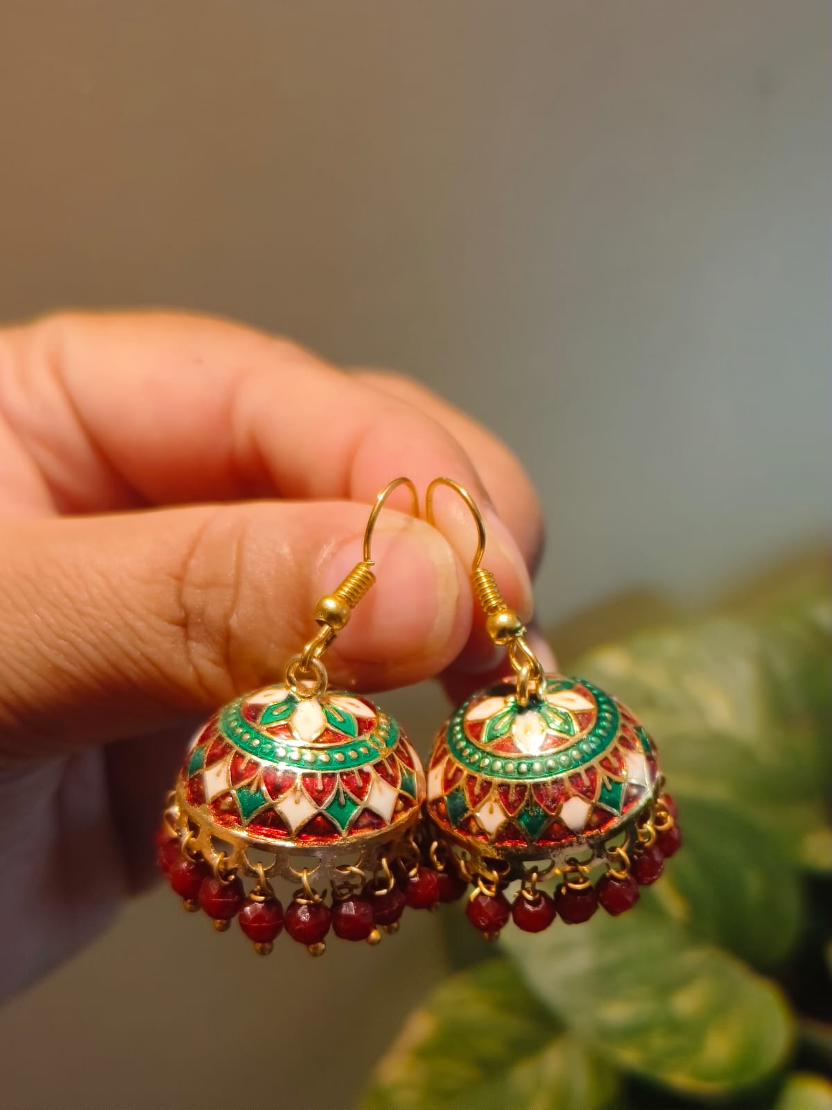 Handmade Meenakari jhumki earrings in red green and gold enamel with red bead fringe – Rivayat Manika Collection