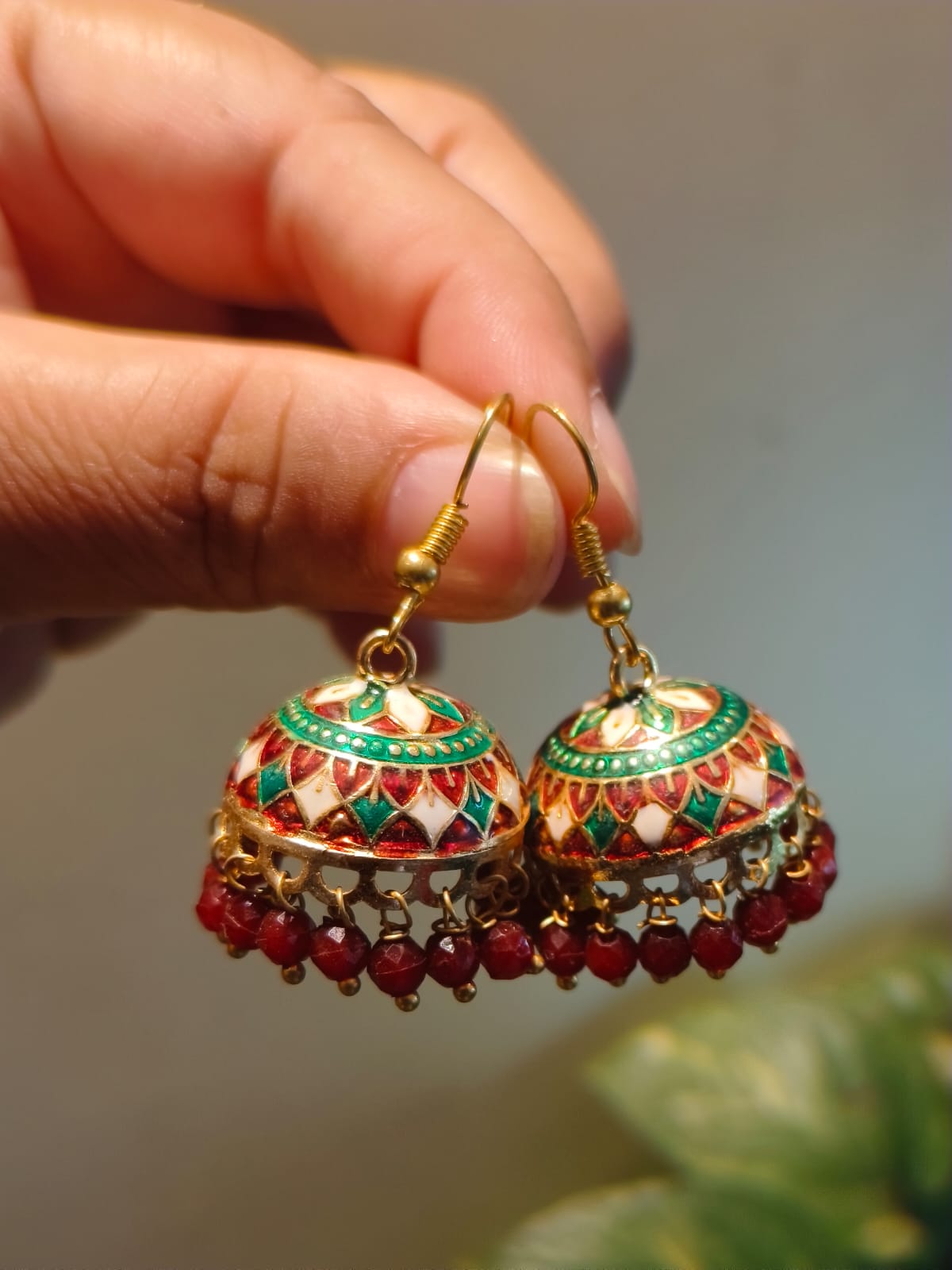 Large Meenakari jhumki earrings with floral enamel dome and dangling red beads – authentic Indian artisan jewellery by Rivayat