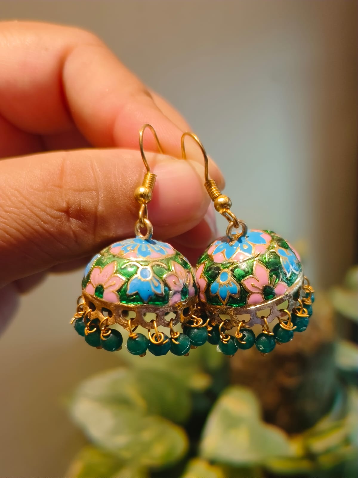 Pair of large Meenakari jhumki earrings with emerald green enamel and hanging teal bead drops – Rivayat Manika Collection