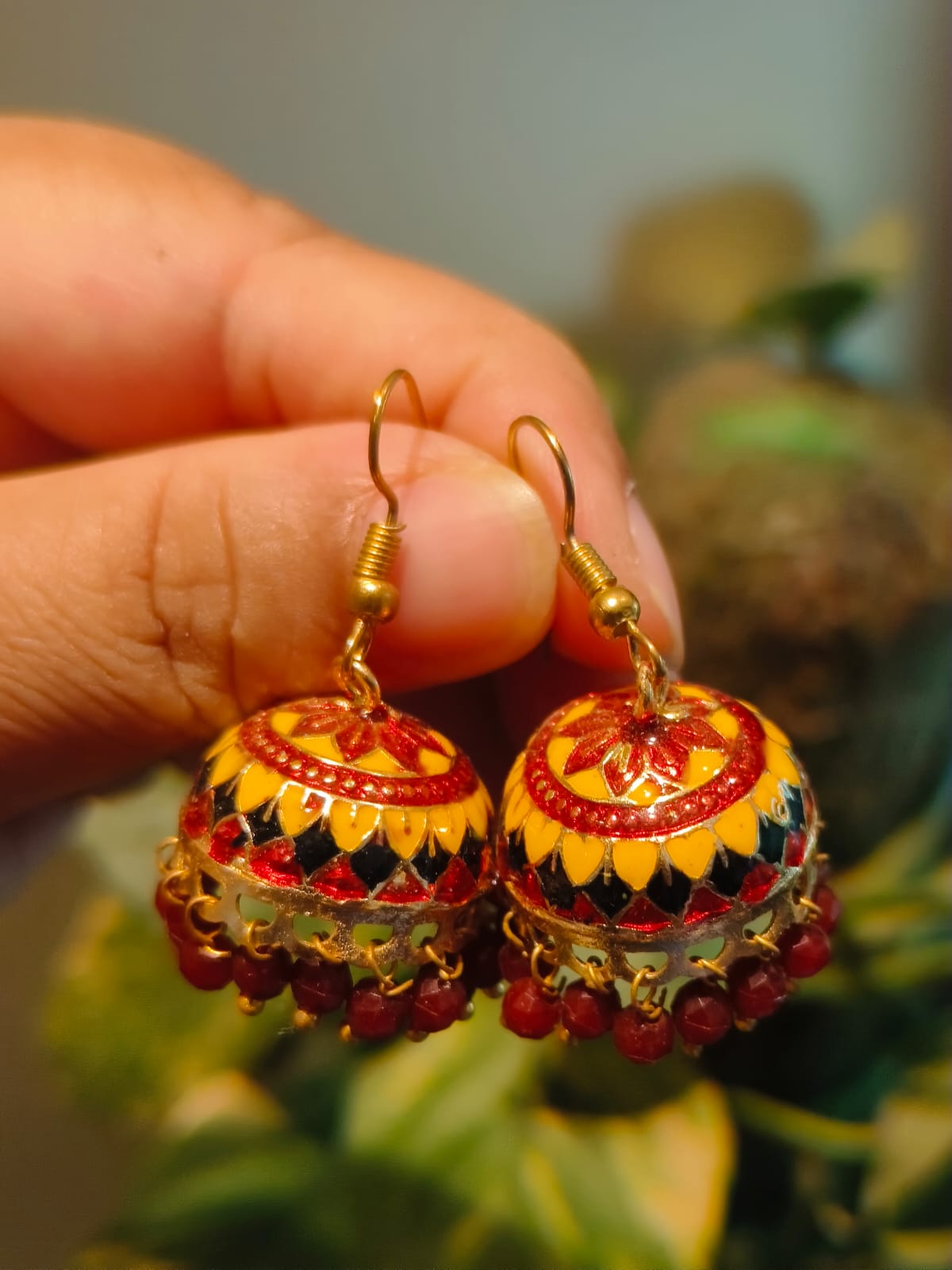 Handmade Meenakari Jhumki in yellow red and black enamel with red bead fringe – Rivayat Manika Collection