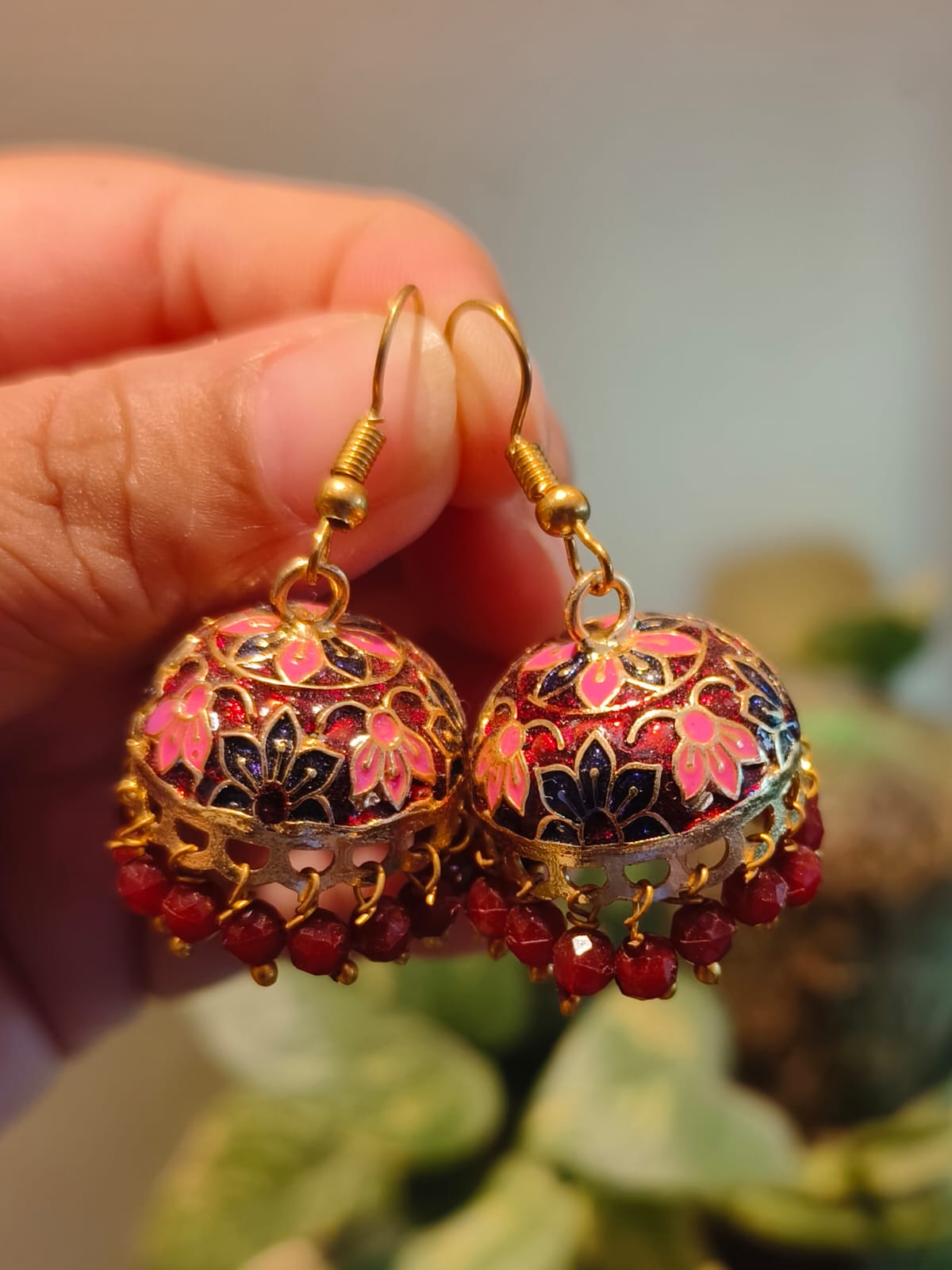 Artisan Meenakari jhumki in red, pink and navy blue enamel with gold tone finish and crystal drops – Rivayat The Heritage