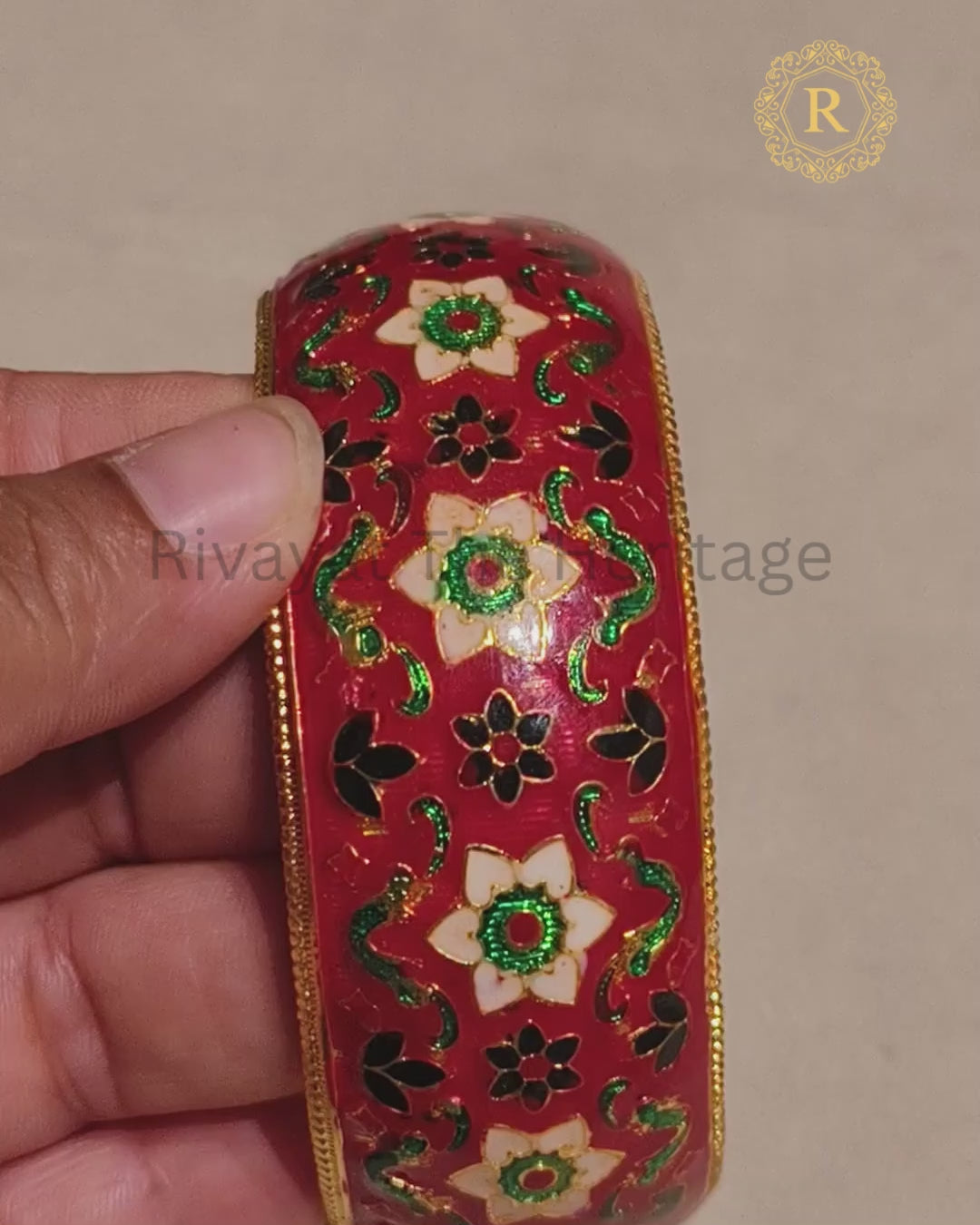 Red floral Meenakari Kada showing detailed enamel work and gold-tone finish