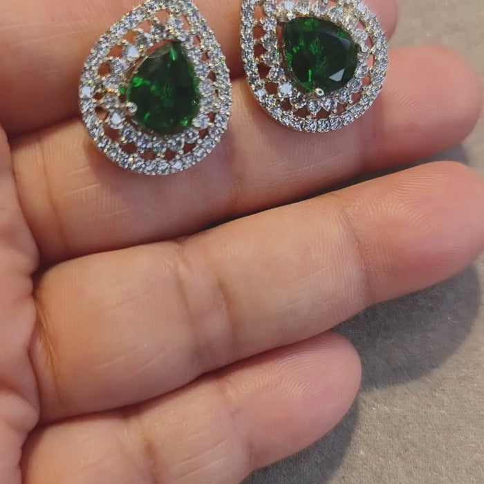 Green zircon teardrop earrings showcasing the green centre stone and sparkling zircon detailing